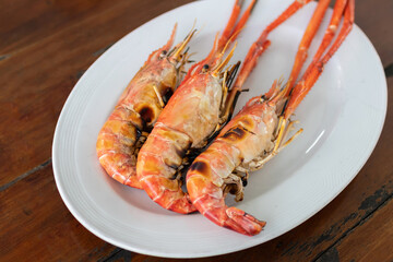 Charcoal grilled river prawns usually served with spicy seafood.