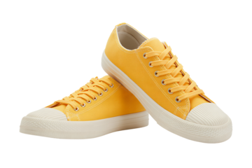 Vibrant yellow canvas sneakers, perfect for casual wear and lifestyle content, offering comfort and stylish design for any occasion