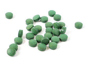 Vitamins antioxidants green. Spirulina Chlorella natural green superfood. dietary supplements. Pills isolated on white background. seaweed medicines. High quality photo