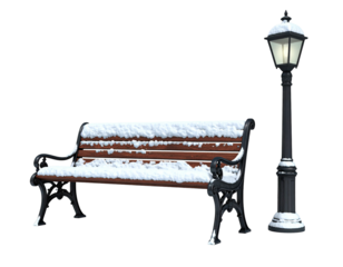 A classic wooden park bench and a vintage lamppost covered in fresh snow isolated on a white background.