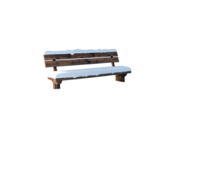 A solitary wooden park bench covered in a layer of fresh snow.