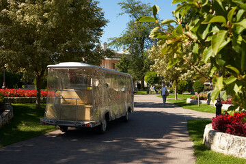 Fototapeta premium An electric excursion vehicle in a picturesque eco-park.