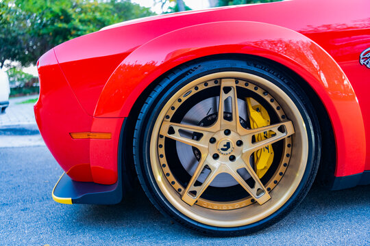 Miami, Florida, USA - April 13, 2025: Sport car Dodge Challenger SRT Hellcat. Car Dodge Challenger SRT parked. Red sportscar, front corner view. 2018 Dodge Challenger SRT Hellcat sportscar car