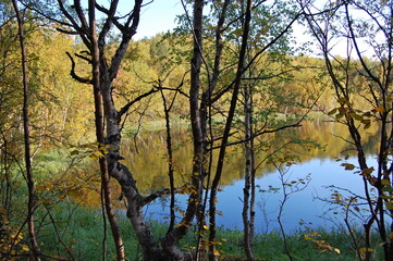 A picturesque lake in the Finnish tundra, Sami territory, amazing nature, Karelia, fantastic landscapes, fishing, tourism.