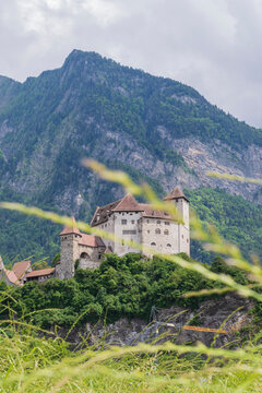Gutenberg Castle on hill in Balzers, Liechtenstein
Picturesque medieval castle on hilltop surrounded by alpine nature and forested mountains. 