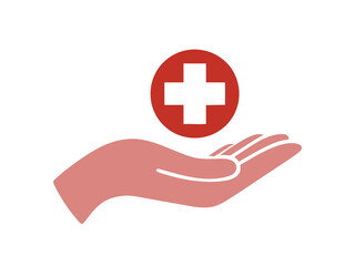 A hand gently holds the red cross symbol. The importance of health