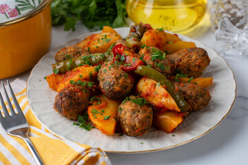 Traditional Homemade Turkish Food Kofte - Kofta with Tomato Sauce and Potatoes. (Turkish name; Izmir kofte)