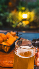 Bistro basket with golden cassava fries and a beautiful pint of beer. Perfect for pub food, casual...