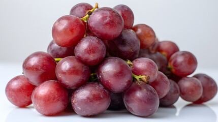 Fototapeta premium Fresh Juicy Red Grapes, Nutrient-Rich Fruit, Healthy Snack Option