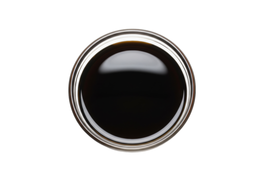Dark soy sauce in a glass bowl isolated PNG, traditional Asian condiment for cooking and seasoning on transparent background
