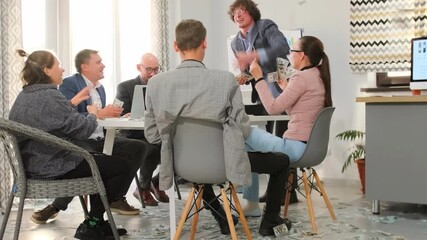 work friends share happy moments, coworkers unite in cheerful celebration with laughter and expenses, lively group of colleagues joyfully marking achievements through shared laughter and expenses