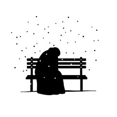 Person sitting alone on a bench in snowfall, wrapped in a blanket