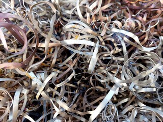 Steel Shavings Scattered on the Workshop Floor After Metal Turning Process