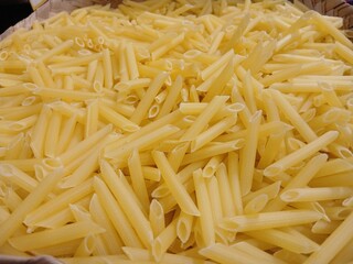 Yellow raw potato crackers in stick shape, suitable for snacks and light meals