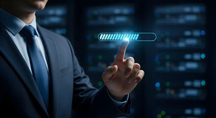 Businessman's Finger Touching a Progress Bar in a Data Center, Representing Technology and Digital Transformation