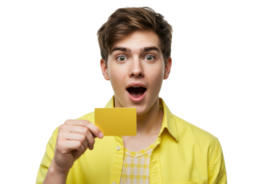 Excited young man holding a yellow card isolated on transparent background PNG, surprised male with credit card for business and finance