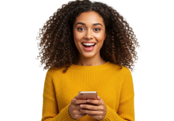 Excited young woman with curly hair using smartphone isolated on transparent background, happy girl in yellow sweater looking at phone PNG