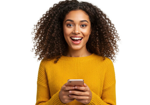 Excited young woman with curly hair using smartphone isolated on transparent background, happy girl in yellow sweater looking at phone PNG