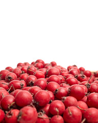 Hawthorn berries piled together, showcasing vibrant red color and fine textures, with soft lighting creating a fresh and natural ambiance, perfect for culinary or health-related concepts