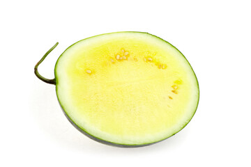 Freshly cut yellow watermelon slice with vibrant green rind, showcasing juicy interior and seeds, perfect for summer fruit displays and healthy eating concepts