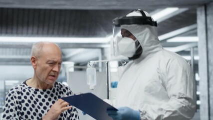 Doctor in hazmat suit administers medical care to a contagious patient, recording health data and testing vaccine responses in a laboratory to develop effective antiviral antibiotics. Camera B. - Powered by Adobe