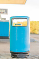 Covered bin at a service station and refuelling point, perfect for mock-ups of pictograms and graphic design