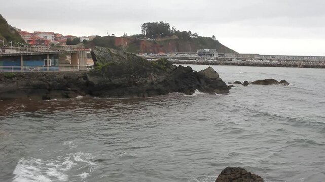 Candas beach in Spain, under grey sky