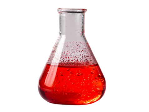 Glass flask containing bright red liquid with bubbles in a laboratory setting illuminated by soft light
