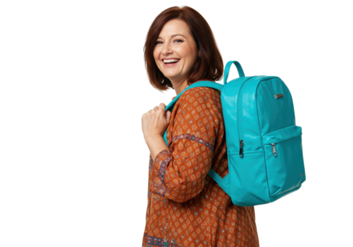 Smiling woman with teal backpack isolated PNG, cheerful mature lady with auburn hair and patterned blouse on transparent background