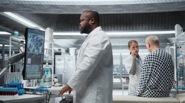 Black medic participates in laboratory drug study monitoring a patient during treatment testing, recording dosage and side effects. Evaluating pharmacology data for healthcare progress. Camera A.
