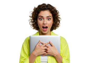 Surprised young woman with laptop isolated on transparent PNG, excited expression with open mouth and crossed fingers for good luck