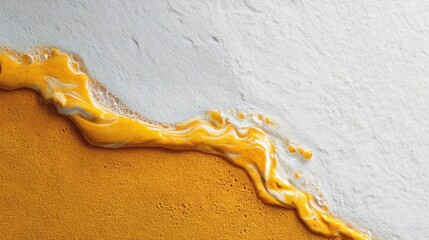 Obraz premium Vibrant Melting Orange and White Swirl on Surface Creating a Stunning Abstract Texture with Smooth Flowing Patterns
