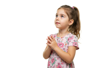 Adorable little girl in floral dress isolated on white, child looking up with hands clasped in prayer for religious or hopeful concept