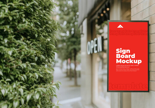 Vertical Poster Mockup in a Darker Urban Setting with Recessed Lighting