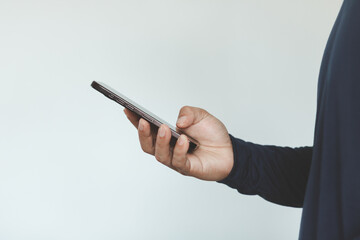 Close-up of man hand holding smartphone with blank screen, showing modern technology, digital communication and mobile device usage for business, social media or online connection concepts.