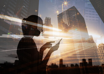 Business communication, woman using smartphone with glowing streaks of light and motion blur in a modern city