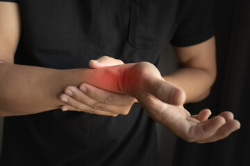 Person with wrist pain muscle soreness sprain 
