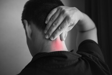 Man having Shoulder and Neck pain at home. Muscle painful due to Myofascial pain syndrome and...