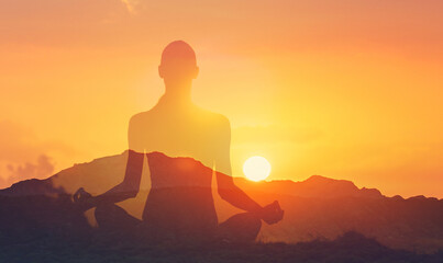 Silhouette of a Woman Practicing Yoga Meditation at Sunset Finding Inner Peace and Balance
