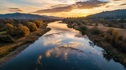 Fototapeta premium river view decorated with mountains and sunlight