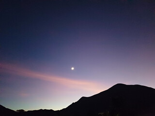 Timelapse of Crescent Moon with Hill Silhouette