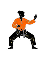 Female Taekwondo athlete in defensive stance ready to fight.