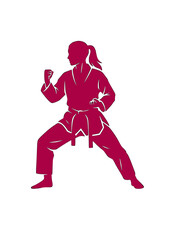 Female Taekwondo athlete in defensive stance ready to fight.