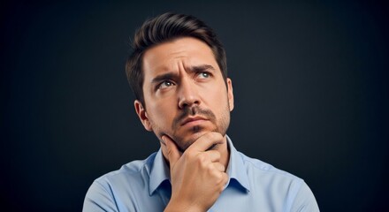Close-up of Man with Pensive and Doubtful Expression, Hand on Chin