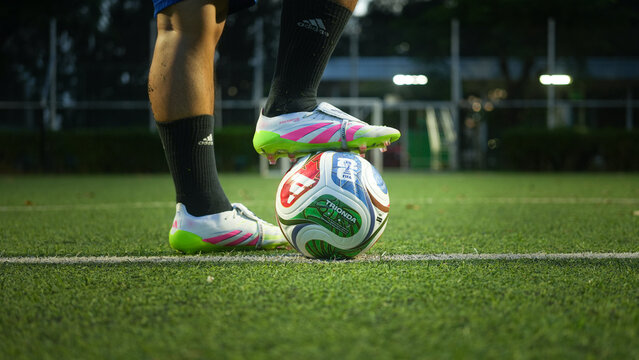 Bangkok, Thailand - 17 October 2025: Adidas launch "Trionda" the official match ball for Fifa World Cup 2026 that co-host with USA, Canada and Mexico. It on the football training pitch.