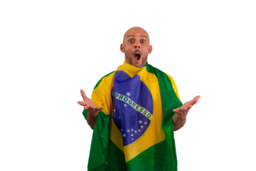 male fan wearing a yellow Brazilian football shirt and the Brazilian flag