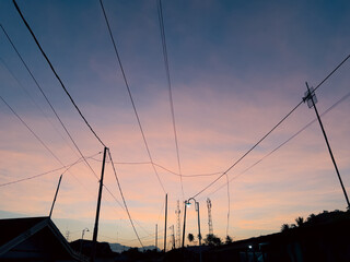 Telephone Wires Against a Colorful Sky at Dusk