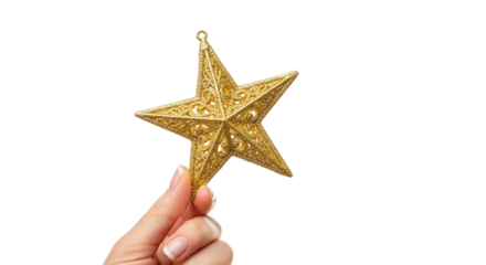 Hand holding a golden star ornament on transparent background