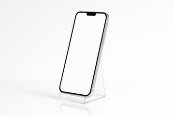 Minimalist white smartphone with blank screen standing on a clear acrylic display stand isolated on white clean tech product mockup