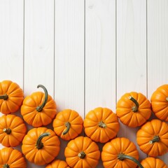 Autumn harvest pumpkins arranged on rustic wooden surface isolated on white background